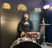 Load image into Gallery viewer, The &#39;JUST DRUM&#39; premium pullover hoodie makes a perfect gift for drummers, percussionists, and music lovers who value quality.
